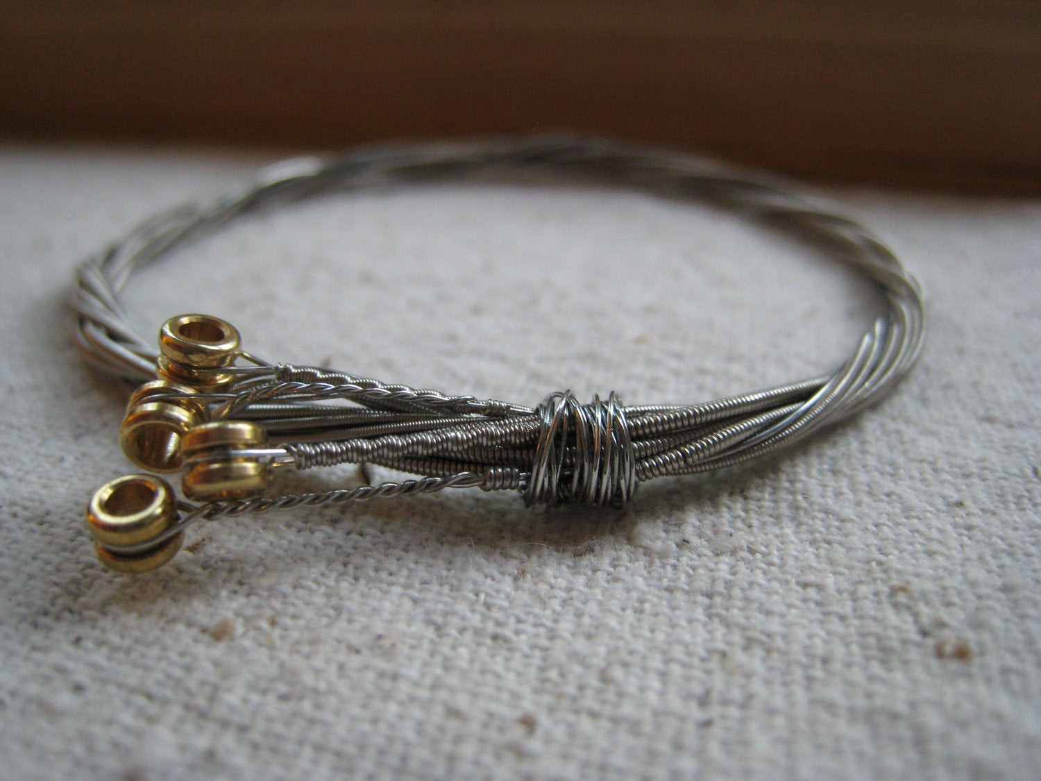 Guitar String Bracelet
 repurposed guitar string bracelet x small by offbeet on Etsy