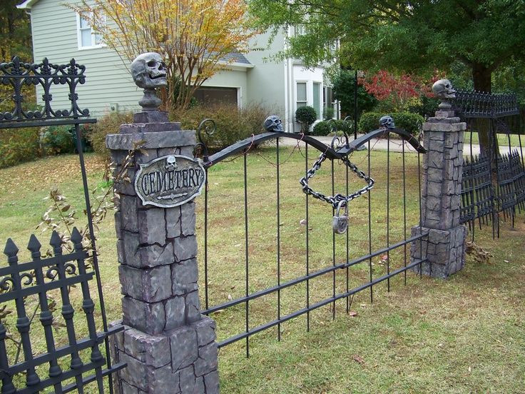 Halloween Cemetery Fence
 skull wood fence diy Google Search