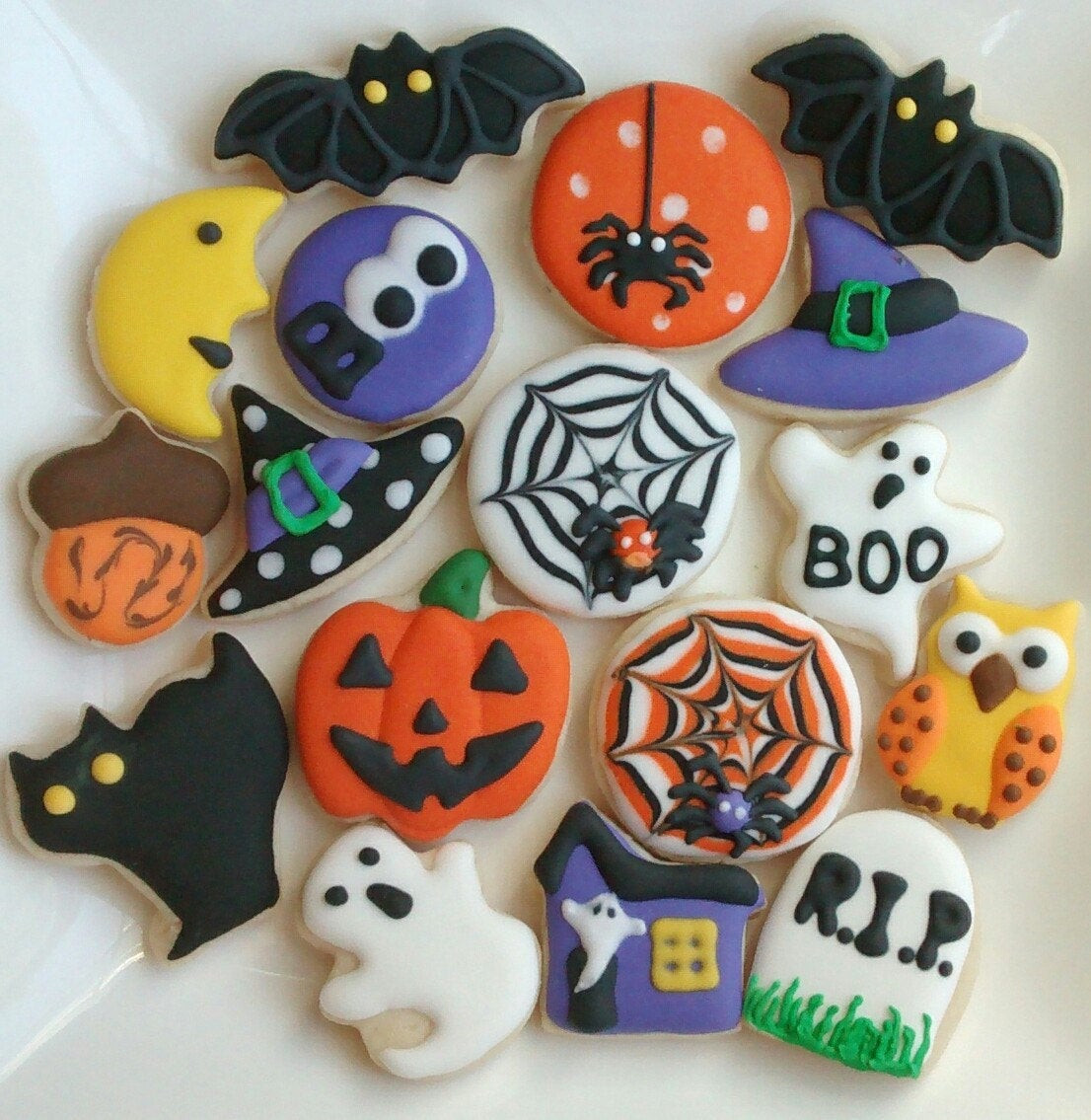 Halloween Cutout Cookies
 Halloween sugar cookies mini or large decorated with royal