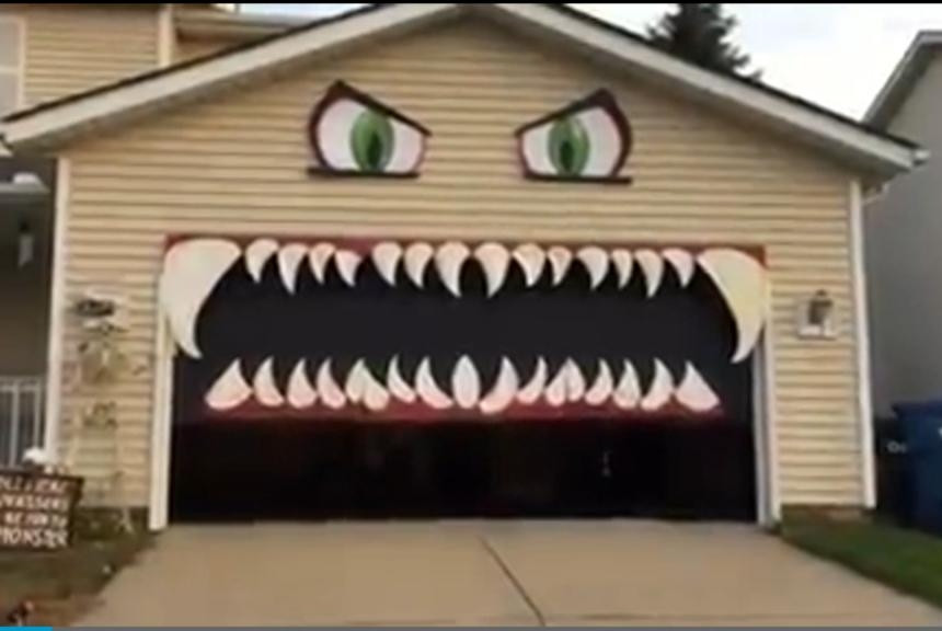 Halloween Garage Ideas
 Watch Garage door forms the mouth of Halloween monster