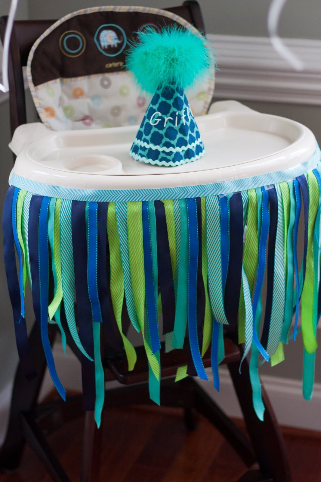 High Chair Decorations 1st Birthday
 Decorated high chair with ribbon and custom birthday party