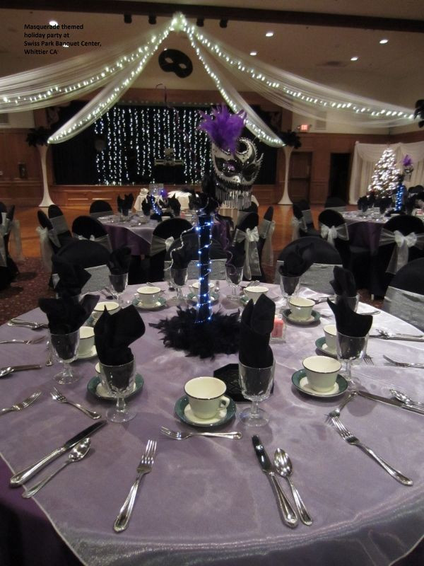 Holiday Masquerade Party Ideas
 Purple silver and black Masquerade themed holiday party