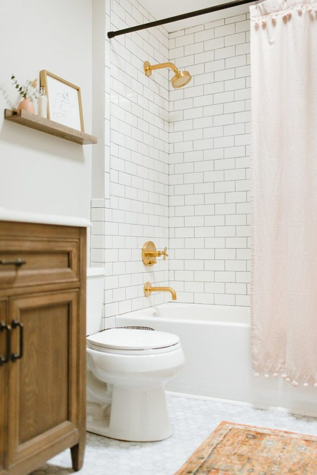 Home Depot Bathroom Tiles
 A gorgeous natural wood vanity and eclectic orange rug