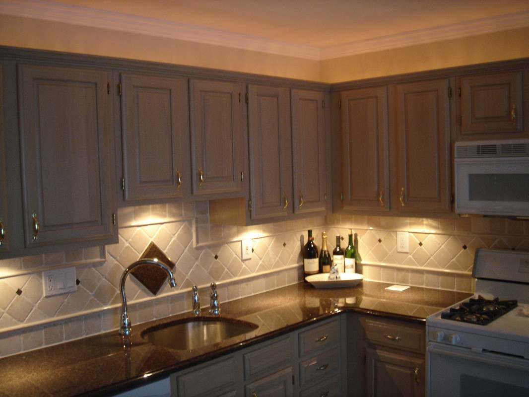 Kitchen Sink And Cabinets
 Over The Sink Lighting Ideas – HomesFeed