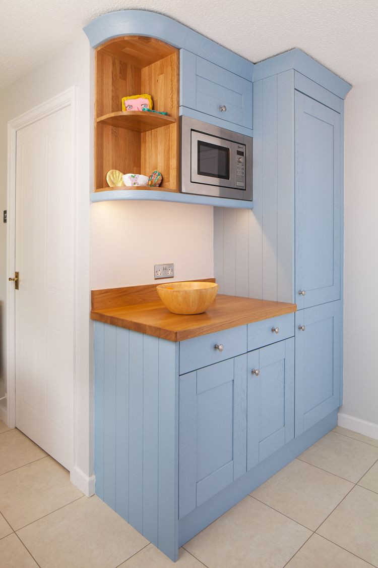 Kitchen Wall Cabinets Height
 This Lulworth Blue kitchen features a variety of cabinetry