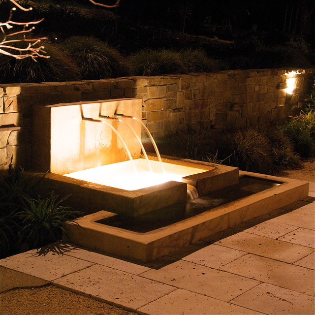 Landscape Fountain Modern
 Fountain at night with stone retaining wall Modern