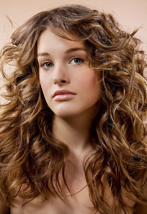 Layered Haircuts For Long Curly Hair
 Long layered haircut with scrunching for wavy haired types