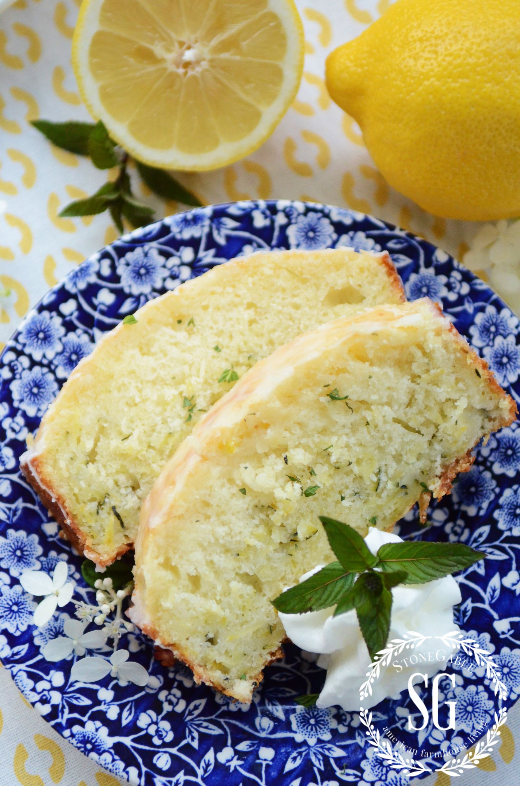 Lemon Zucchini Bread Recipe
 Glazed Lemon Zucchini Bread slices and lemons