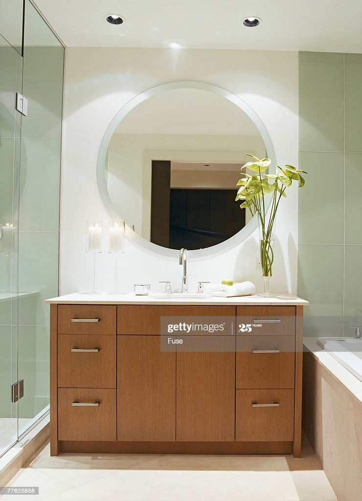 Mirrors Over Bathroom Sinks
 Round Wall Mirror Over Sink In Contemporary Bathroom Stock