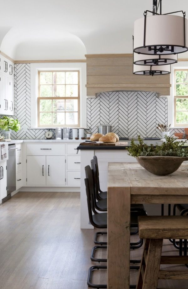 Modern Farmhouse Kitchen Backsplash
 Herringbone tile backsplash in a modern farmhouse kitchen