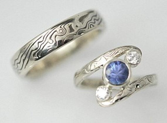 Mokume Gane Wedding Rings
 Two Ring Mokume Gane Wedding Rings with Blue Sapphire