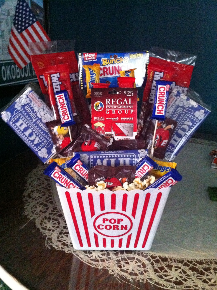 Movie Themed Gift Basket Ideas
 Movie themed basket With a regal t card in middle