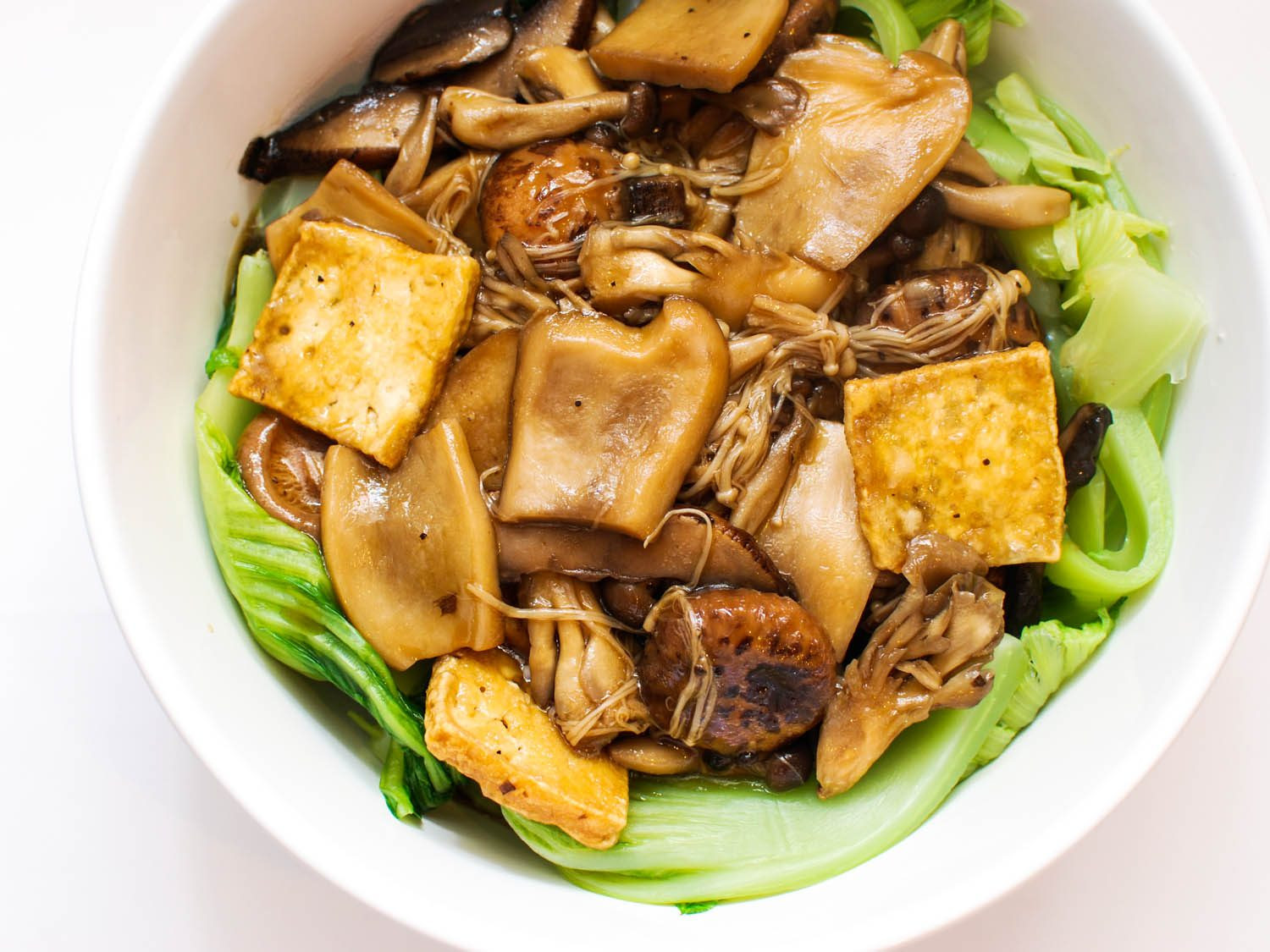 New Vegetarian Recipes
 Mushrooms and Tofu With Mustard Greens is a Ve arian