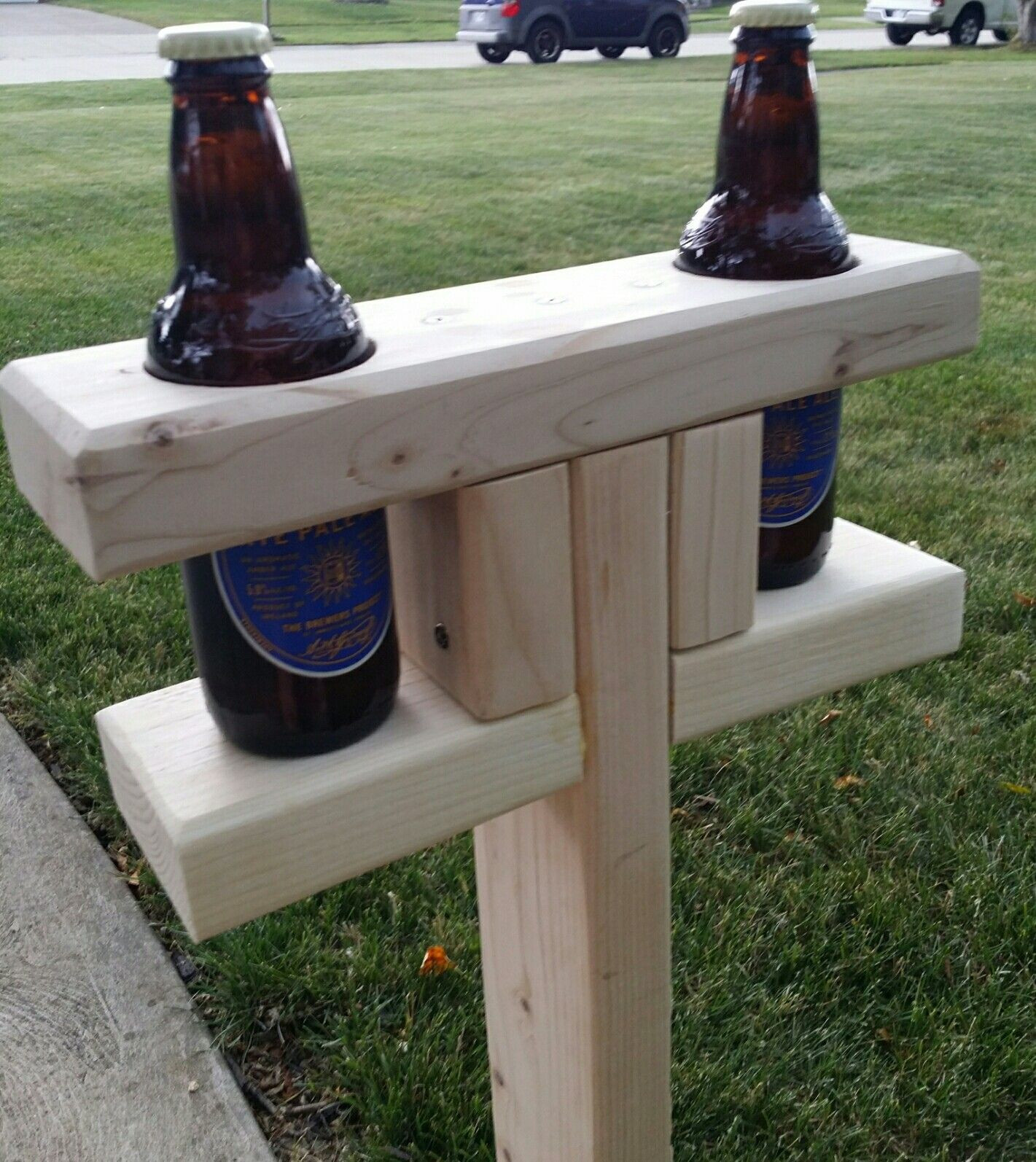 Outdoor Drink Holders DIY
 Yard stake beer bottle holder for cornhole or horseshoes
