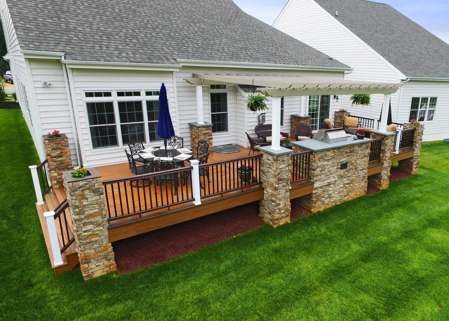 Outdoor Kitchen On Wood Deck
 Wood Decks vs posite Decks