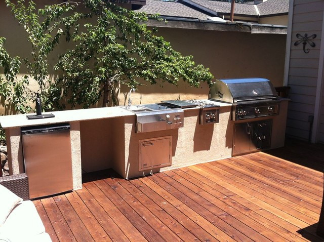 Outdoor Kitchen On Wood Deck
 Wood Deck and Outdoor Kitchen at Rianda