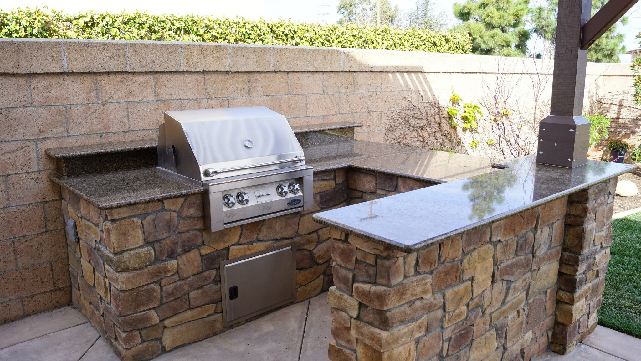 Outdoor Kitchen Stone Veneer
 Renovated Outdoor Kitchen Island with new Raised Bar Faux