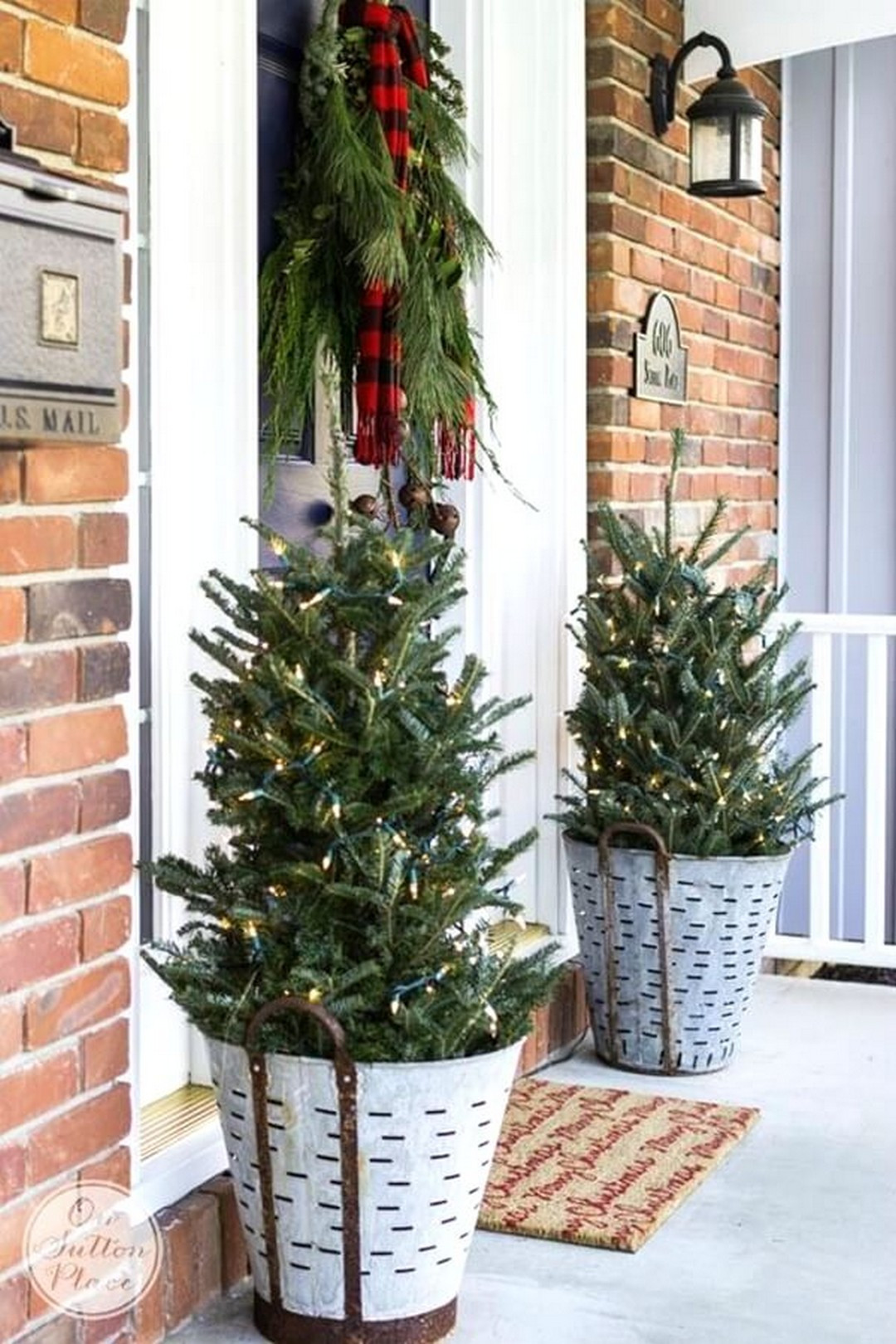Outdoor Porch Christmas Tree
 35 Fancy Outdoor Holiday Planter Ideas To Enliven Your