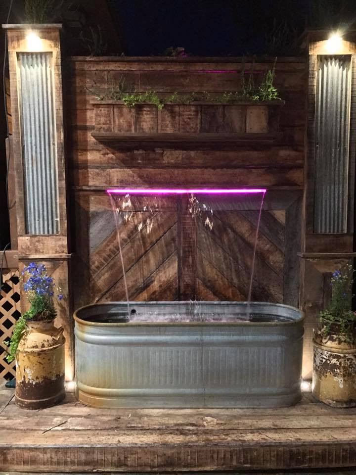Outdoor Wall Fountains DIY
 This Waterfall Fountain Is Made of Troughs and Old Wood
