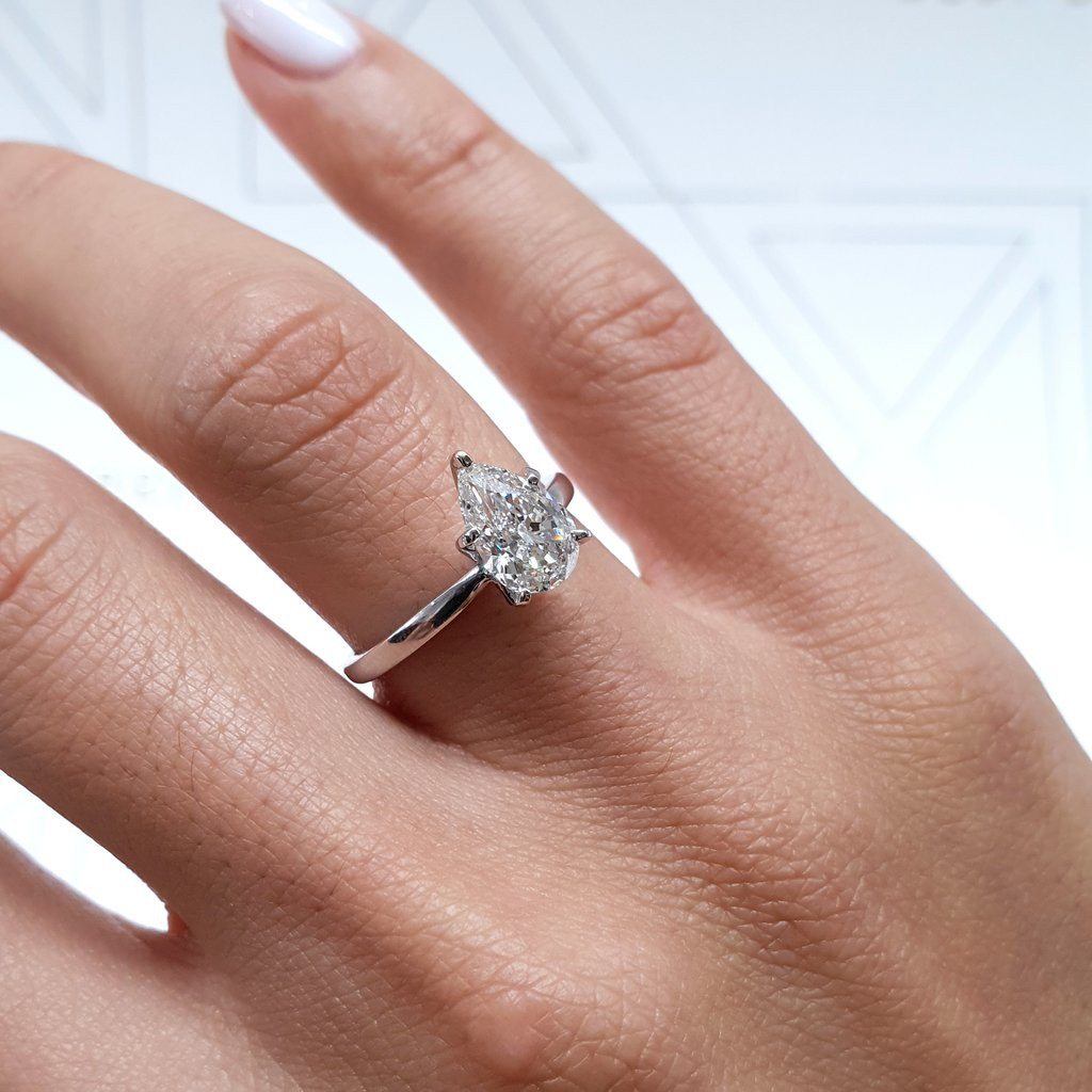 Pear Shaped Diamond Engagement Rings
 1 Carat Pear Shaped Diamond Engagement Ring 14K White