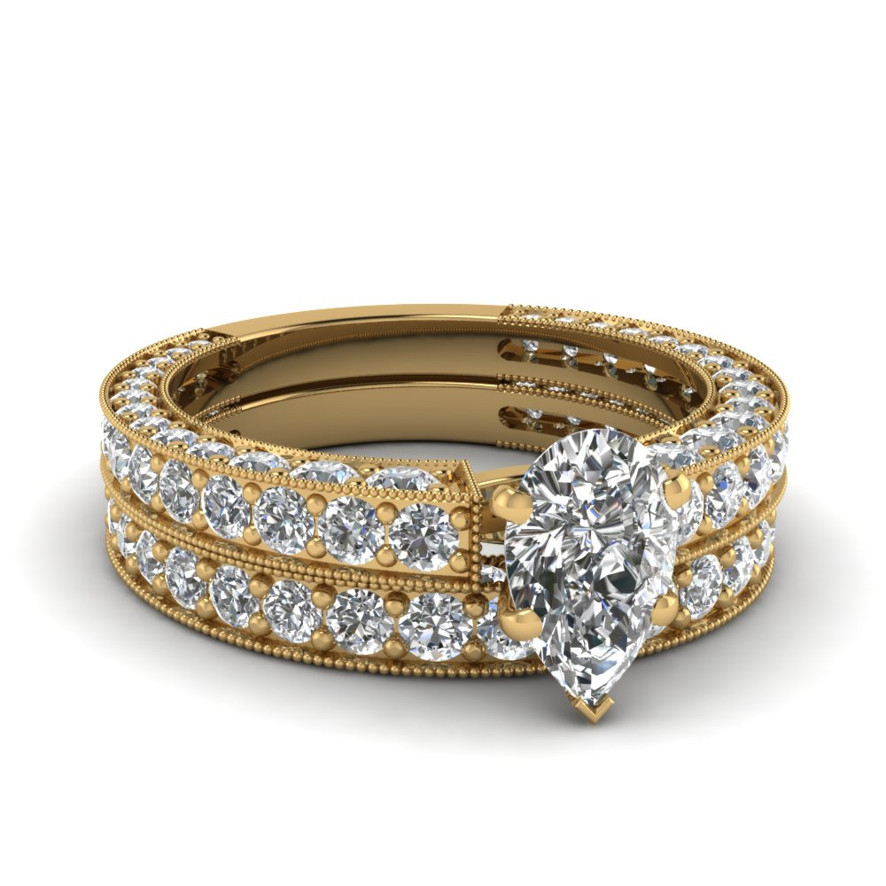 Pear Shaped Wedding Ring Sets
 Pear Shaped Diamond Wedding Ring Set In 14K Yellow Gold
