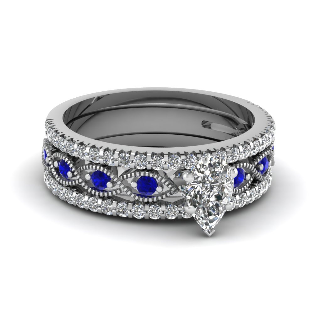Pear Shaped Wedding Ring Sets
 Pear Shaped Milgrain Diamond Trio Bridal Sets With Blue
