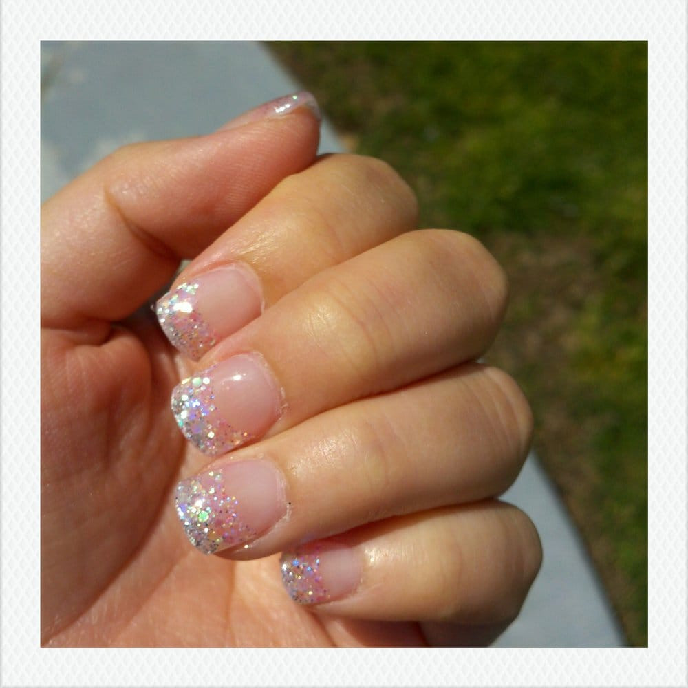 Pink Nails With Glitter Tips
 glitter tip very light pink on the bottom silver on the