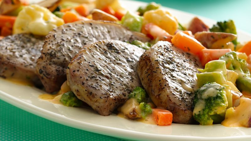 Pork Chops And Vegetables
 Roasted Pork Chops with Cheesy Ve ables Recipe