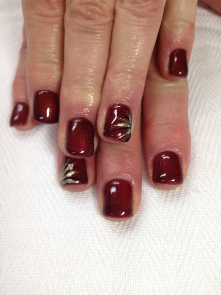 Pretty Fall Nails
 Burgundy fall gel nails with pretty accents All done with