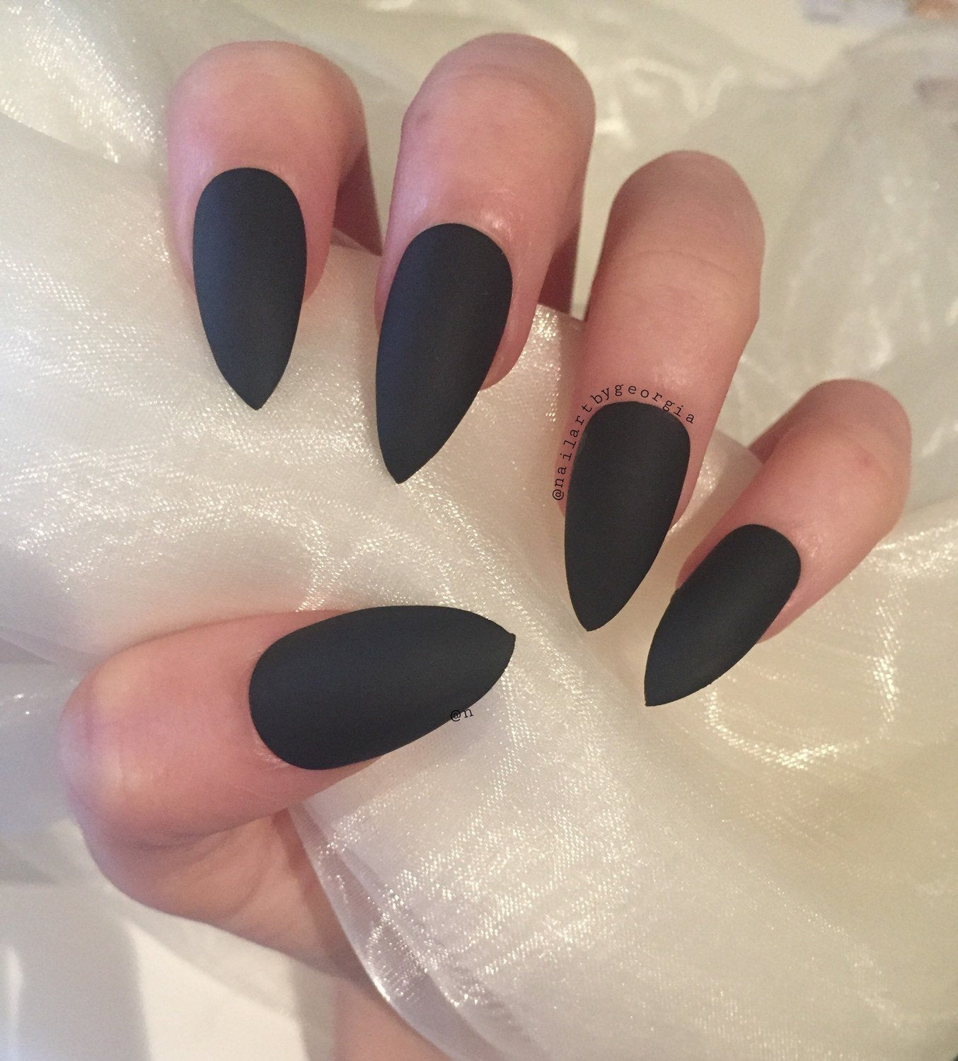 Pretty Stiletto Nails
 Beautiful matte black stiletto nails by nailartbygeorgia