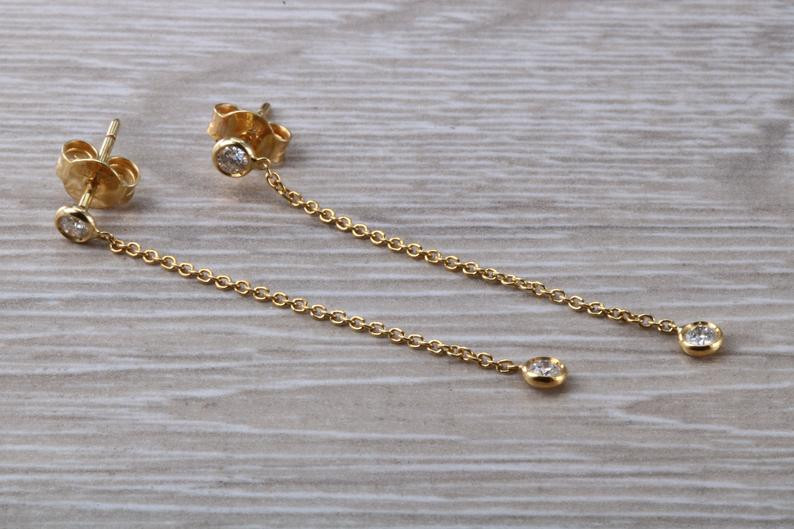 Quarter Carat Diamond Earrings
 Quarter Carat Diamond Dropper Earrings in 18ct Yellow Gold