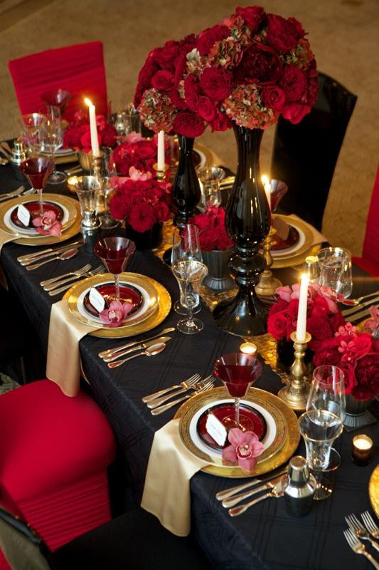 Red Wedding Decorations
 Picture a Gothic wedding tablescape done in black red