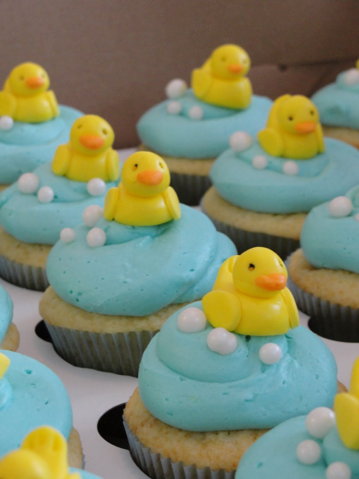 Rubber Duckies Cupcakes
 Oh just put a cupcake in it Rubber Duckie Cupcakes