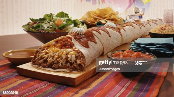 Side Dish For Burritos
 Giant Burrito With Side Dishes Stock