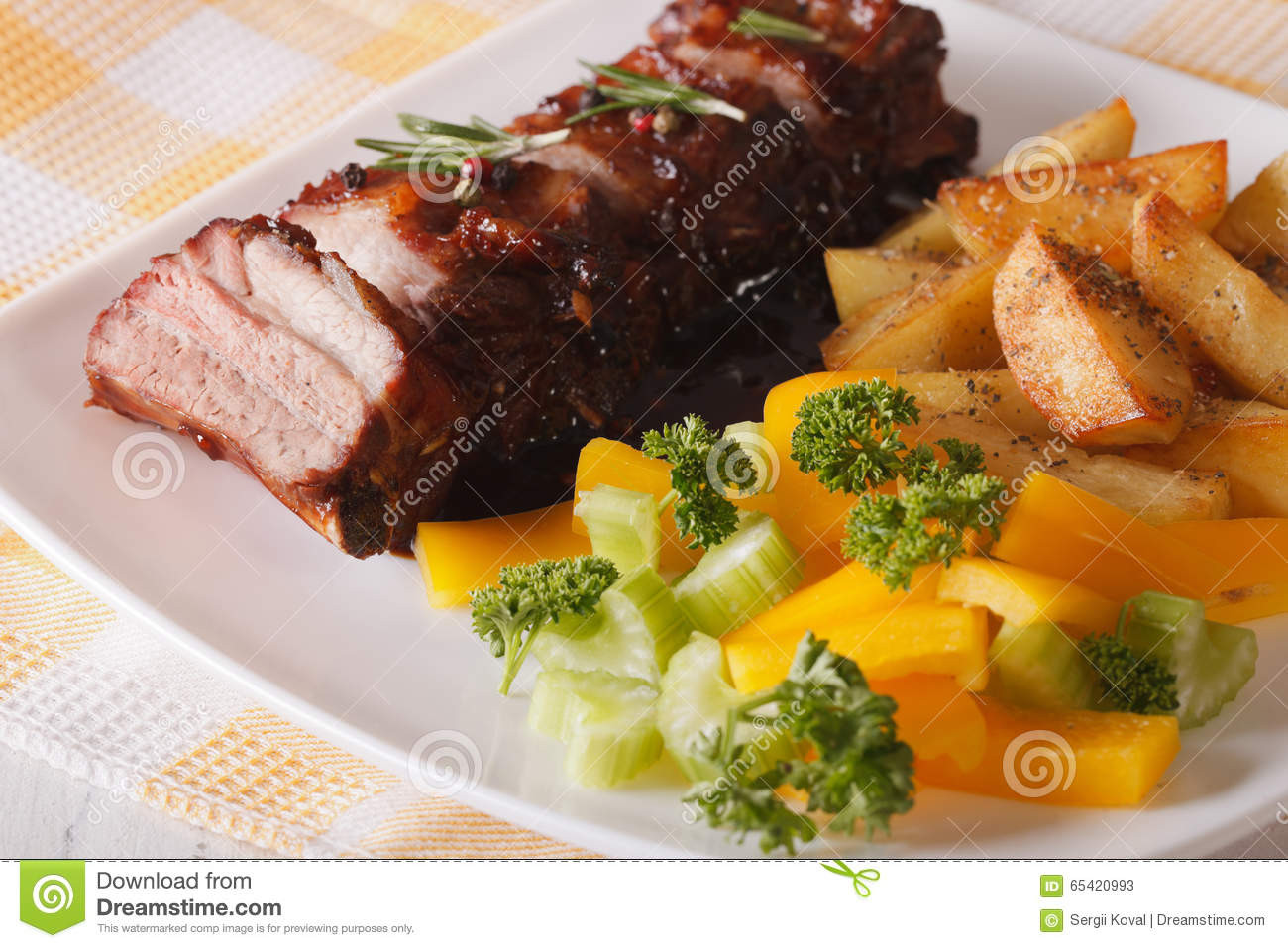 Side Dishes For Barbecue Ribs
 BBQ Pork Ribs With A Side Dish Ve ables Close up