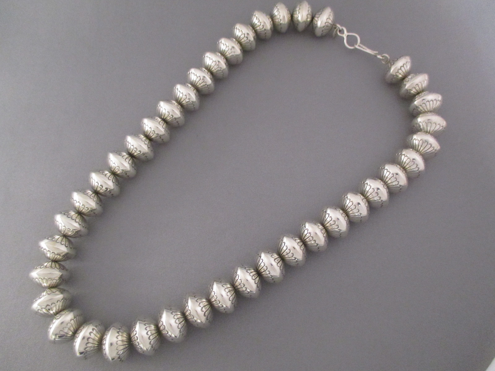 Silver Bead Necklace
 Marie Yazzie Stemped Sterling Silver Bead Necklace Jewelry