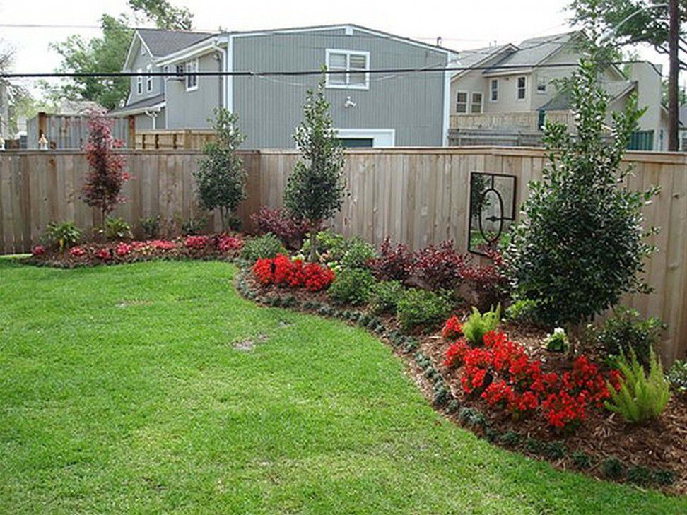 Small Backyard Fence
 Backyard landscaping along fence