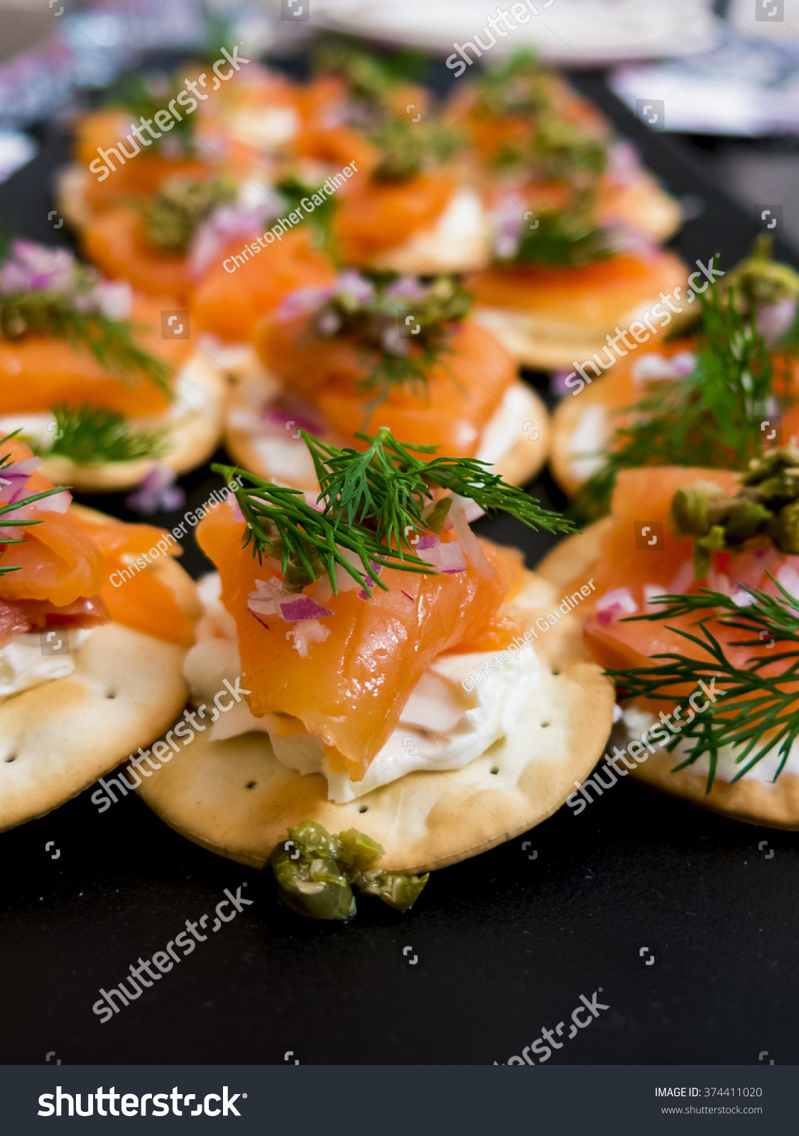 Smoked Salmon And Crackers Appetizer
 Smoked Salmon And Cracker Appetizer Stock
