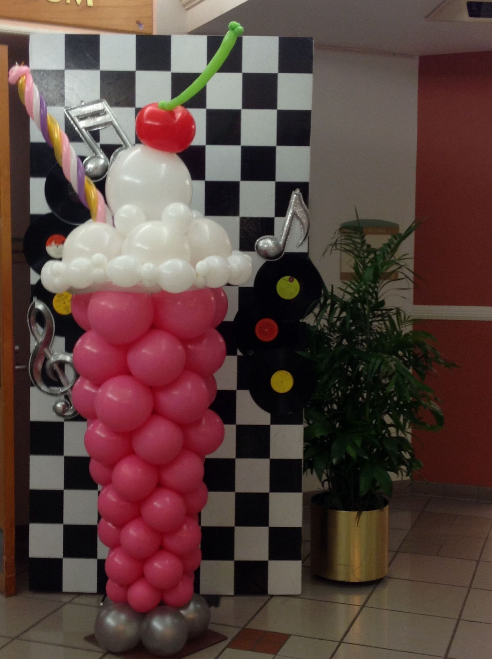 Sock Hop Decorations DIY
 really like this use PVC piping for straw and wrap with
