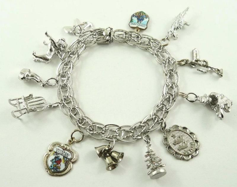Sterling Silver Charm Bracelets
 Vintage Sterling Silver Charm Bracelet with 12 Charms