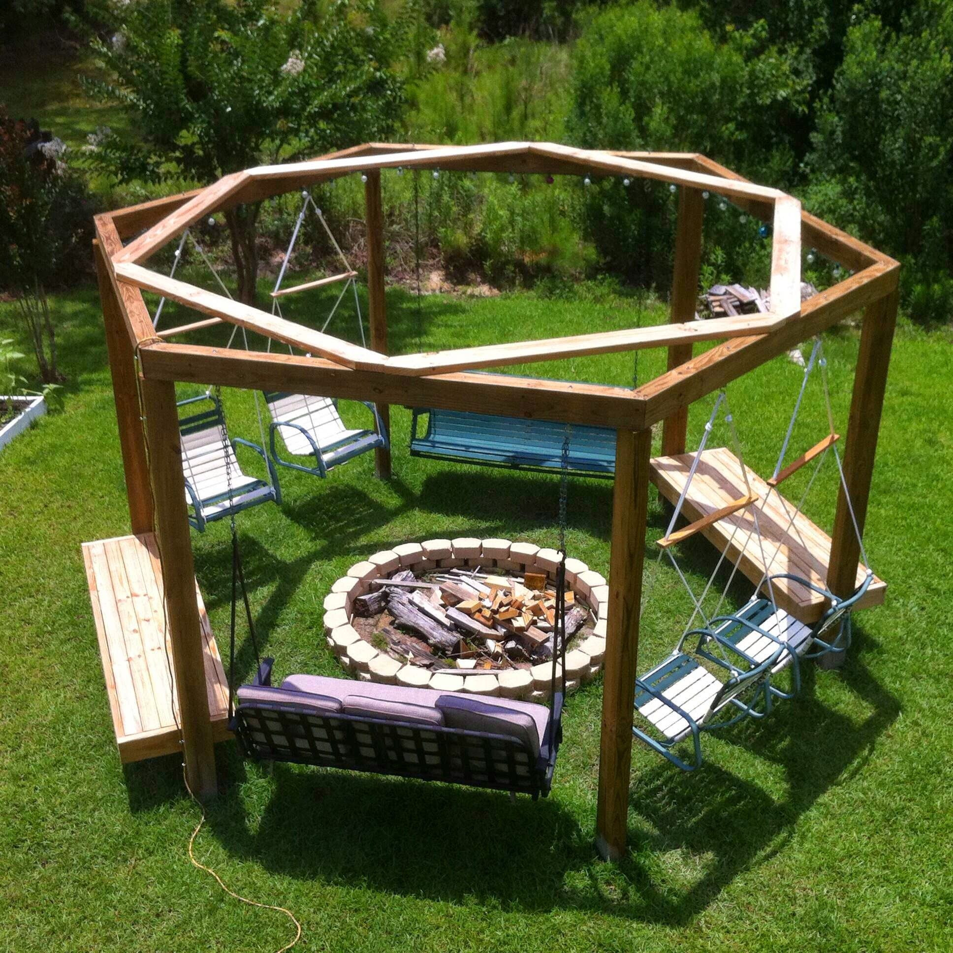 Swinging Bench Fire Pit
 Hexagonal fire pit swingset with repurposed lawn chairs