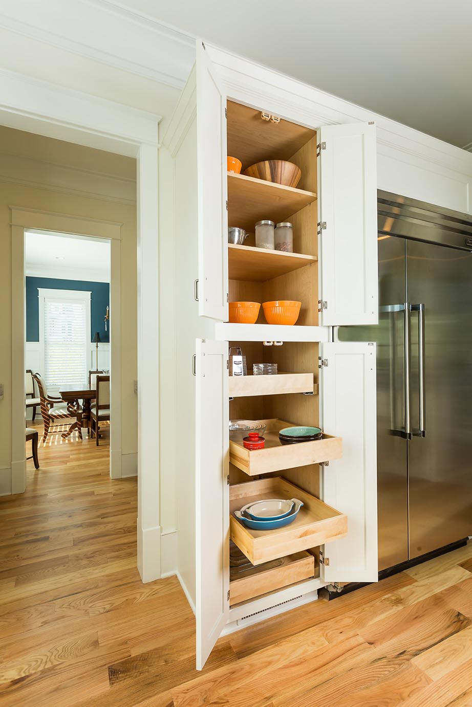 Tall White Kitchen Storage Cabinet
 Luxury South Carolina Home features Inset Shaker Cabinets