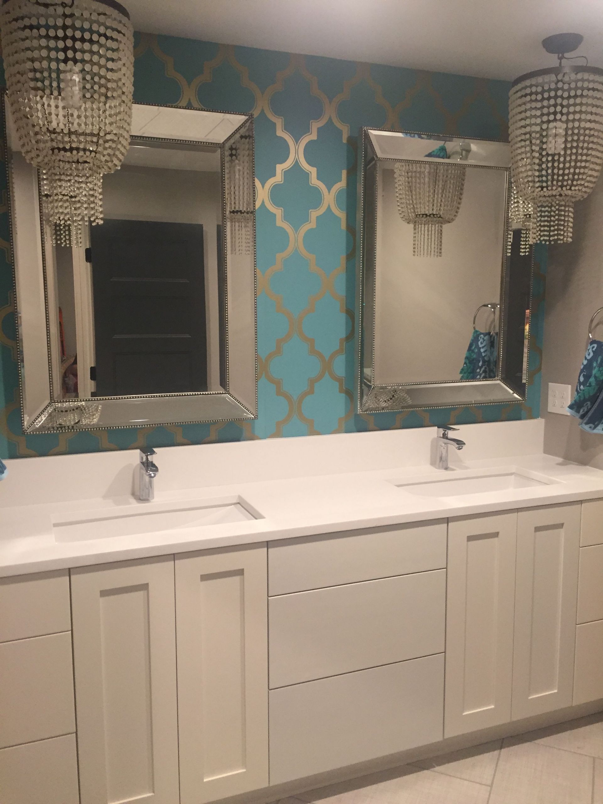 Target Mirrors Bathroom
 Kids downstairs bathroom Teal and gold tar wall paper