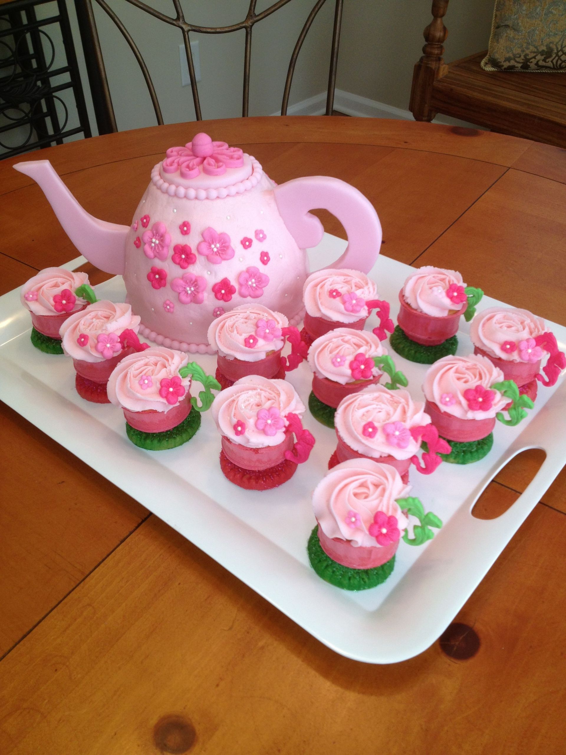 Tea Party Cupcakes Ideas
 Teapot cake with teacup cupcakes The teacups are made