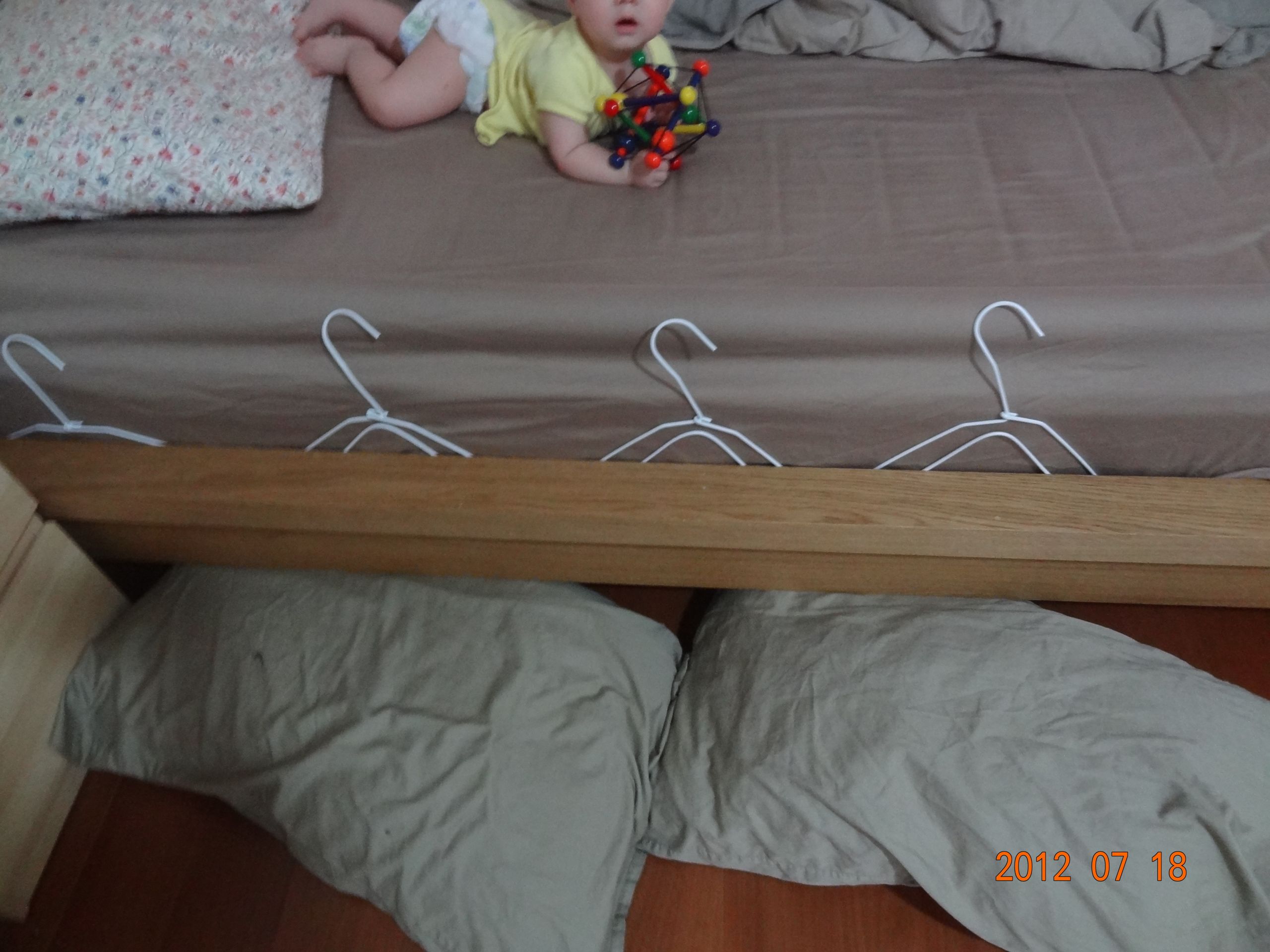 Toddler Bed Rails DIY
 DIY baby Bedrail with swimming noodle