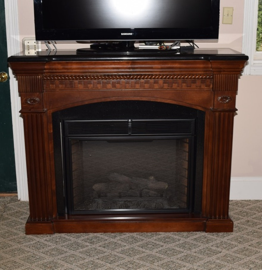 Twinstar Electric Fireplace
 Twin Star Faux Electric Fireplace in Mahogany Mantel with
