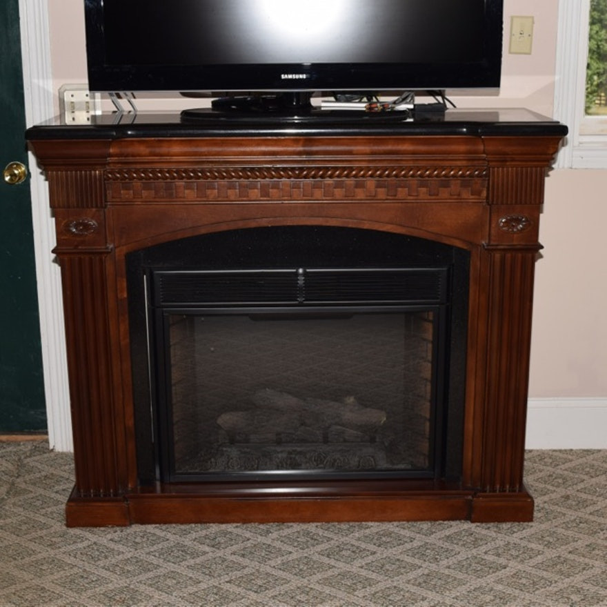 Twinstar Electric Fireplace
 Twin Star Faux Electric Fireplace in Mahogany Mantel with