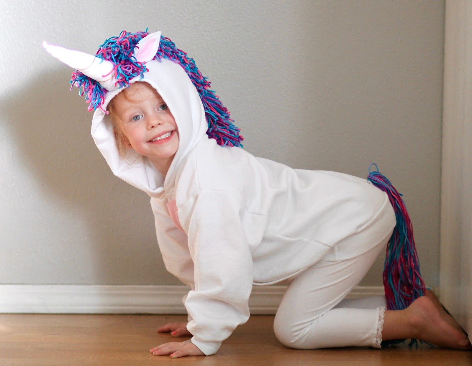 Unicorn Costume DIY
 watch out for the woestmans No Sew Unicorn Costume DIY