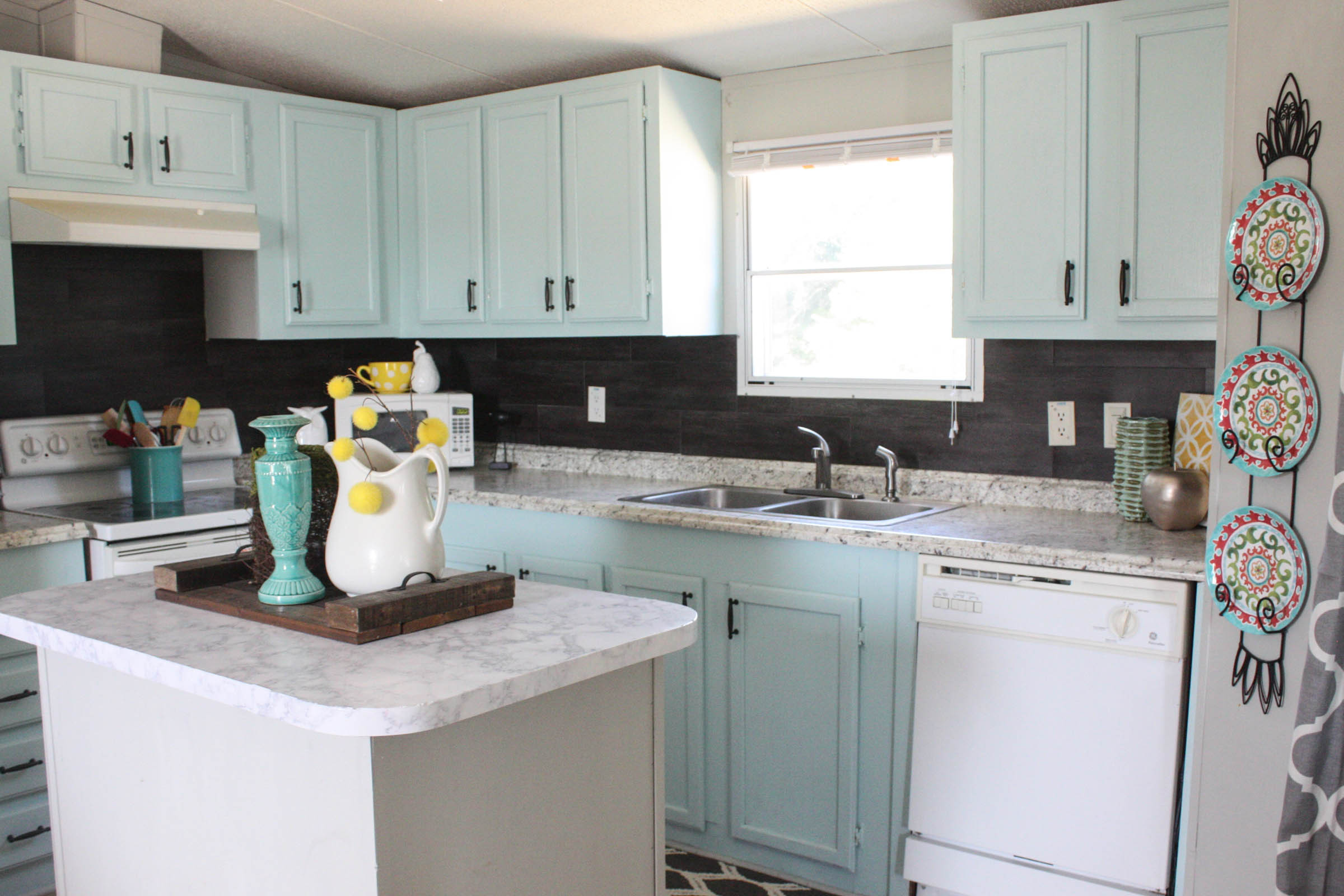 Vinyl Kitchen Backsplash
 Our $40 Backsplash Using Vinyl Flooring Re Fabbed