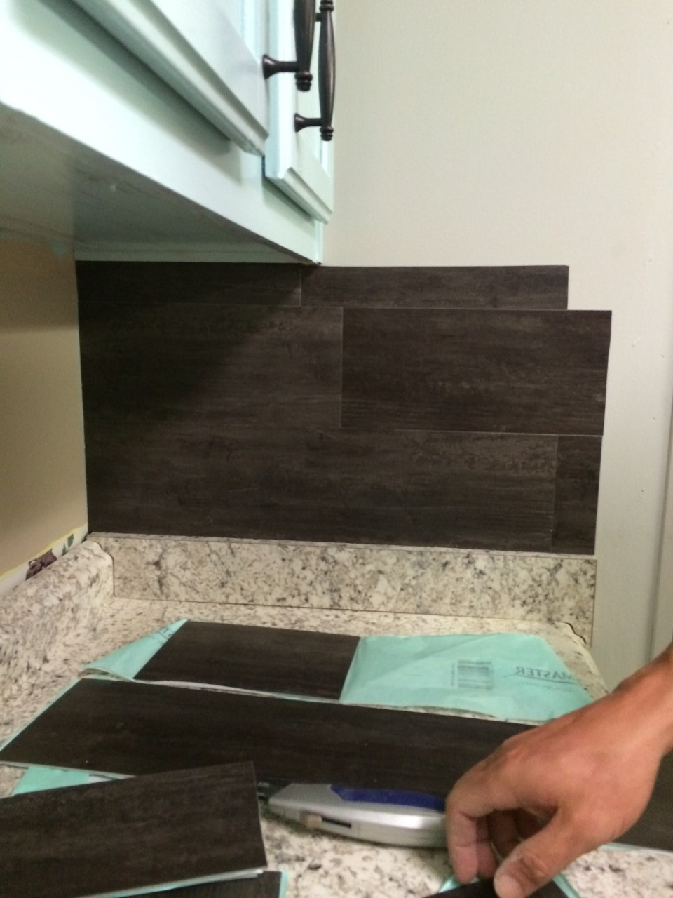 Vinyl Kitchen Backsplash
 Our $40 Backsplash Using Vinyl Flooring Re Fabbed